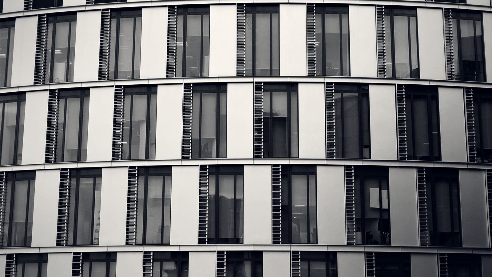 A curved commercial façade in a Gauteng business precinct.