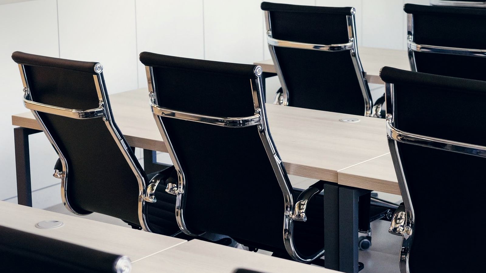 A meeting room set for a board discussion.